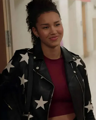 Celebrity wearing a biker-style jacket